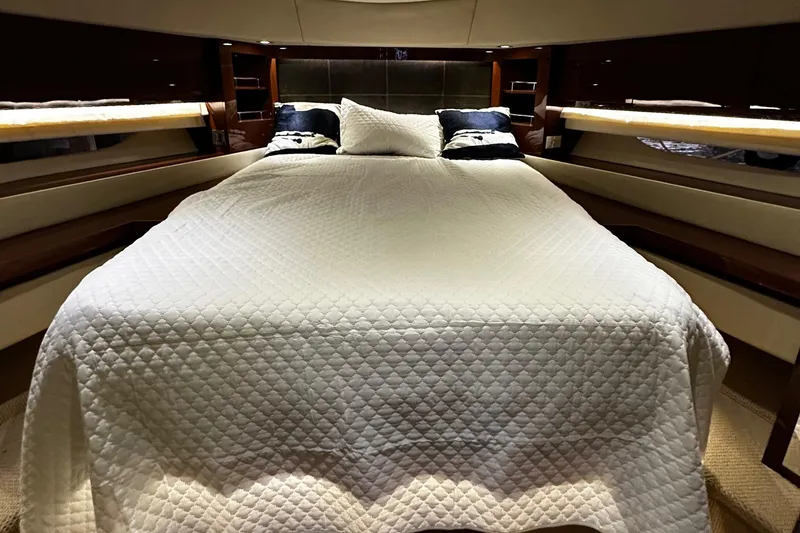 Slide: The Image of Luxurious bedroom on a 2015 Sea Ray 510 Fly yacht. - 38