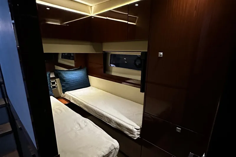 Slide: The Image of Interior of 2015 Sea Ray 510 Fly with twin beds. - 39