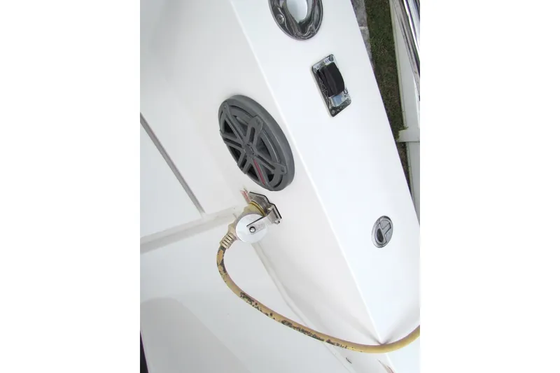 Slide: The Image of 2018 Axopar 37 Sun-Top boat detail with speaker and power connection. - 24