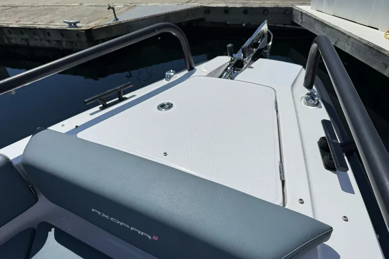 Slide: The Image of 2022 Axopar Brabus 28 Cabin boat deck with sleek design and modern features. - 45