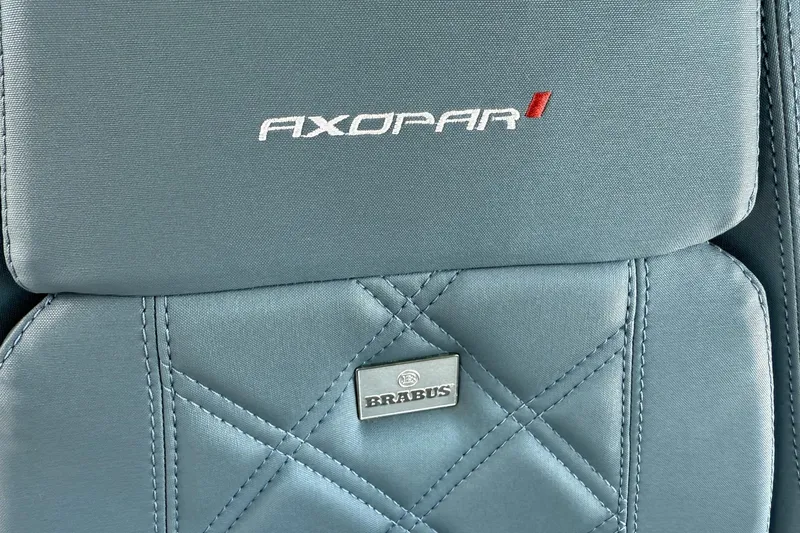 Slide: The Image of Quilted seat detail of 2022 Axopar Brabus 28 Cabin with branded embroidery. - 52