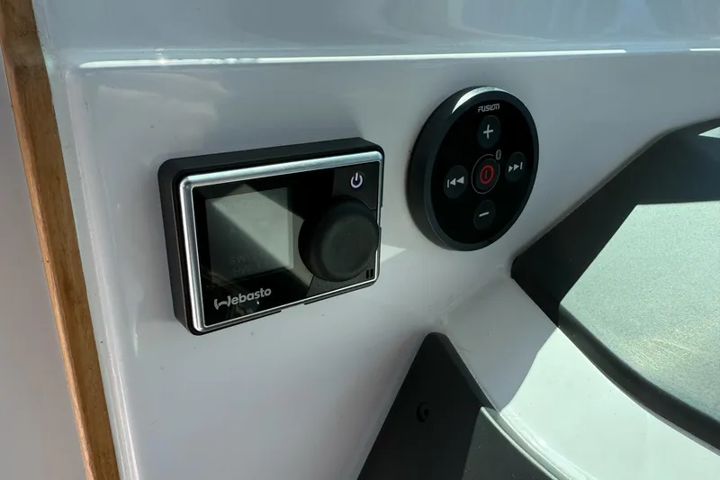 Slide: The Image of Control panel of 2022 Axopar Brabus 28 Cabin with Webasto and Fusion systems. - 53