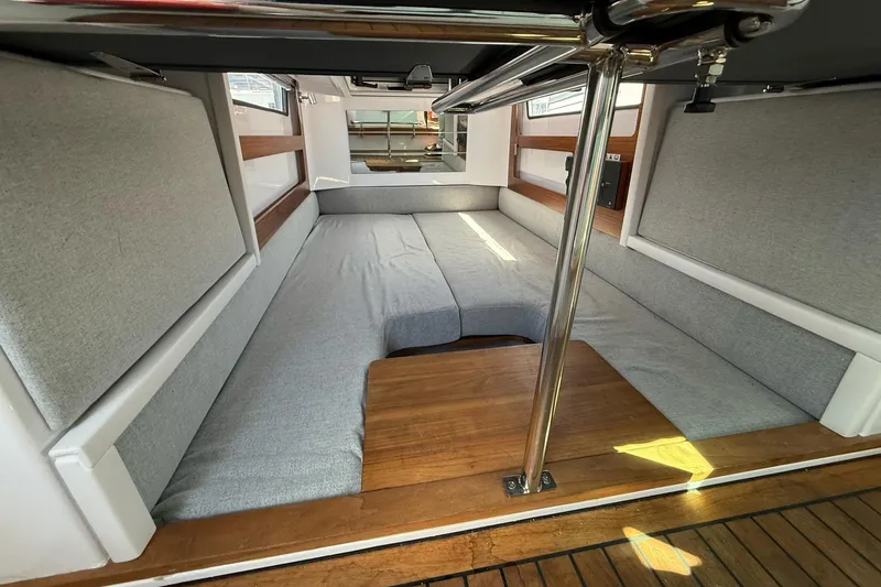 Slide: The Image of Interior cabin of 2022 Axopar Brabus 28, featuring sleek design and comfortable seating. - 71