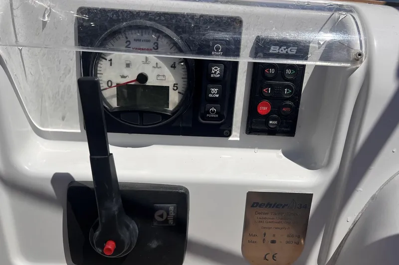 Slide: The Image of Control panel of a 2019 Dehler 34 yacht with gauges and switches. - 16