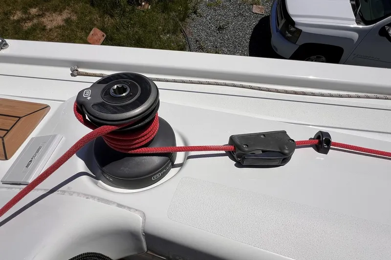 Slide: The Image of Winch and red rope on 2019 Dehler 34c sailboat deck. - 19