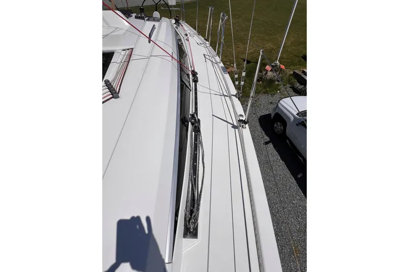 Slide: The Image of 2019 Dehler 34c yacht deck with rigging and shadow. - 25