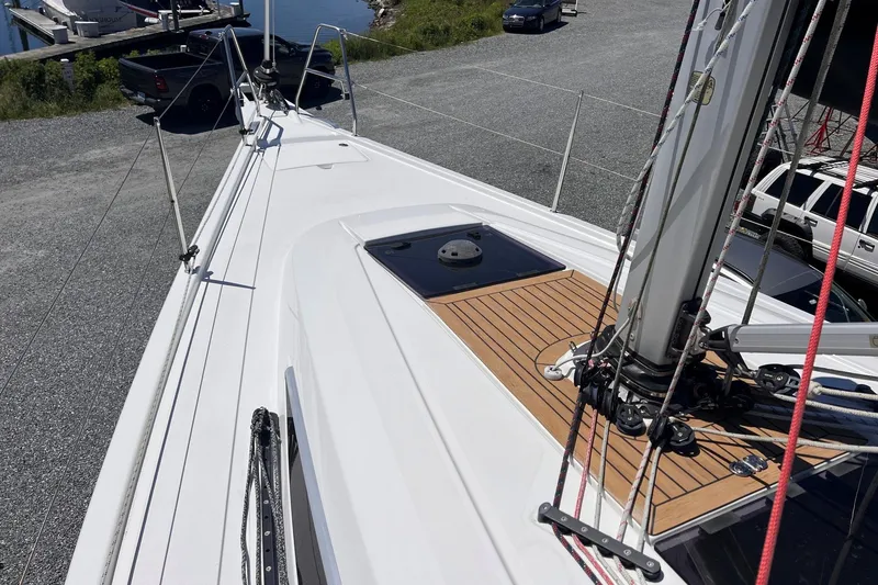 Slide: The Image of 2019 Dehler 34c sailboat deck with mast and rigging, dockside view. - 27