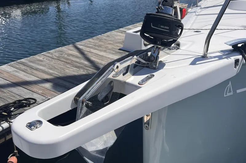 Slide: The Image of Dehler 34 (2019) yacht bow with anchor and Selden equipment at dock. - 32