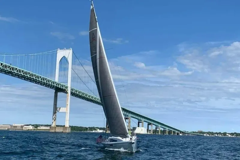 Slide: The Image of 2019 Dehler 34c sailboat on stands, displayed outdoors under clear blue sky. - 4