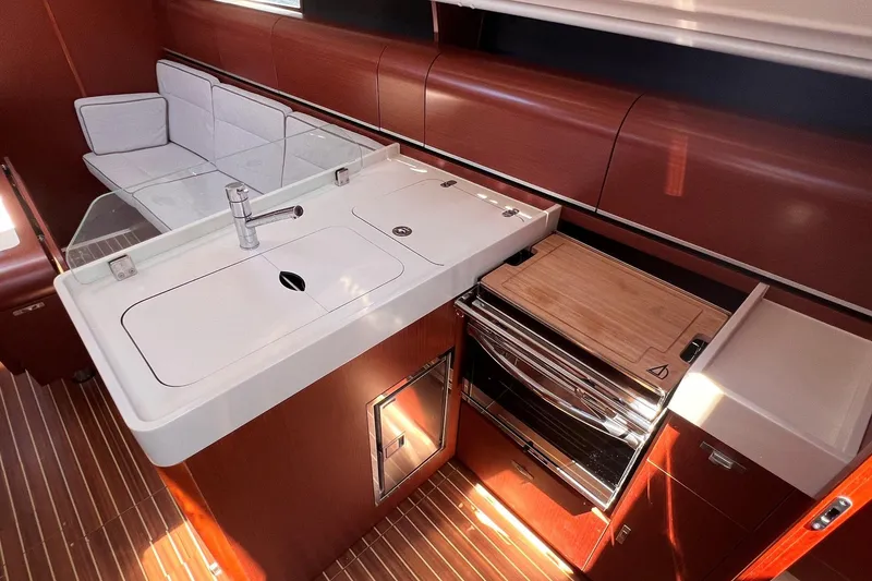 Slide: The Image of Luxurious interior of 2019 Dehler 34 yacht with modern kitchen amenities. - 40