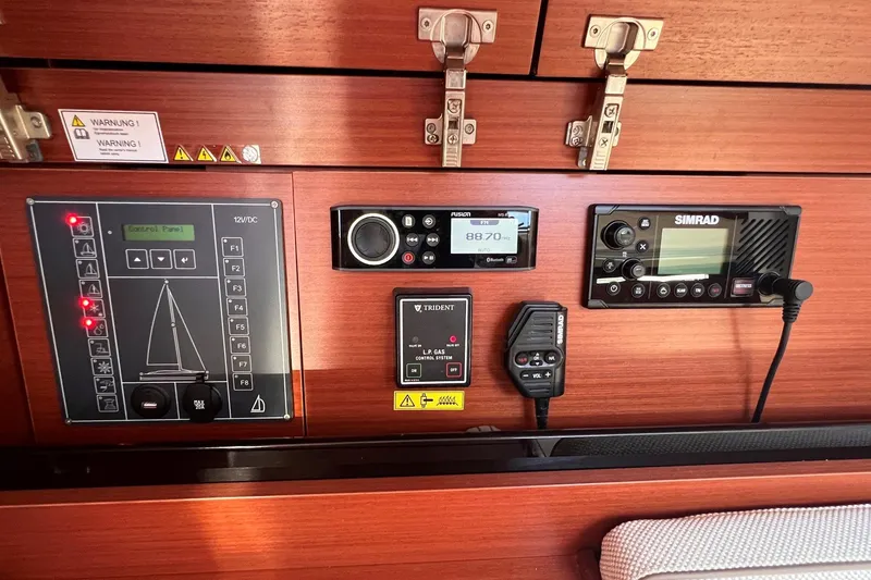 Slide: The Image of Control panel of a 2019 Dehler 34 yacht with navigation and communication equipment. - 44