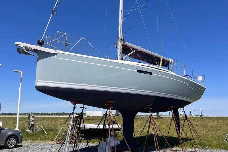 Slide: The Image of 2019 Dehler 34c sailboat on stands, clear blue sky background. - 5