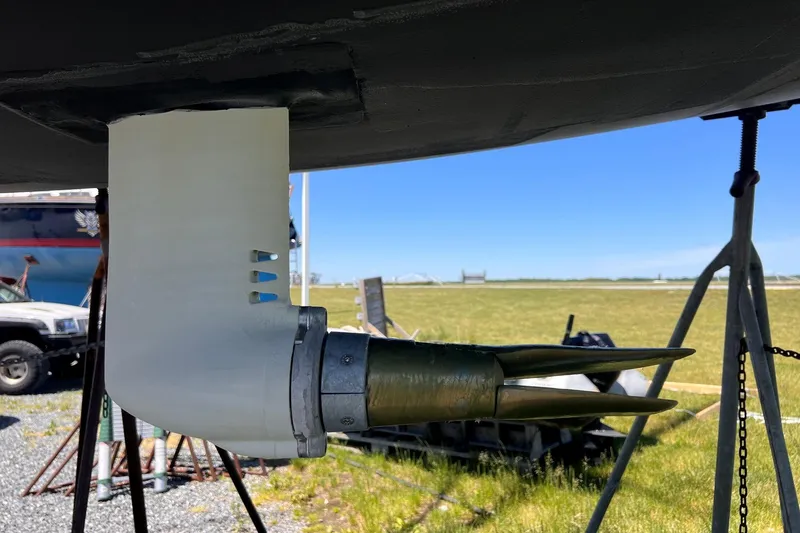 Slide: The Image of Dehler 34c 2019 sailboat propeller and rudder detail on land. - 50