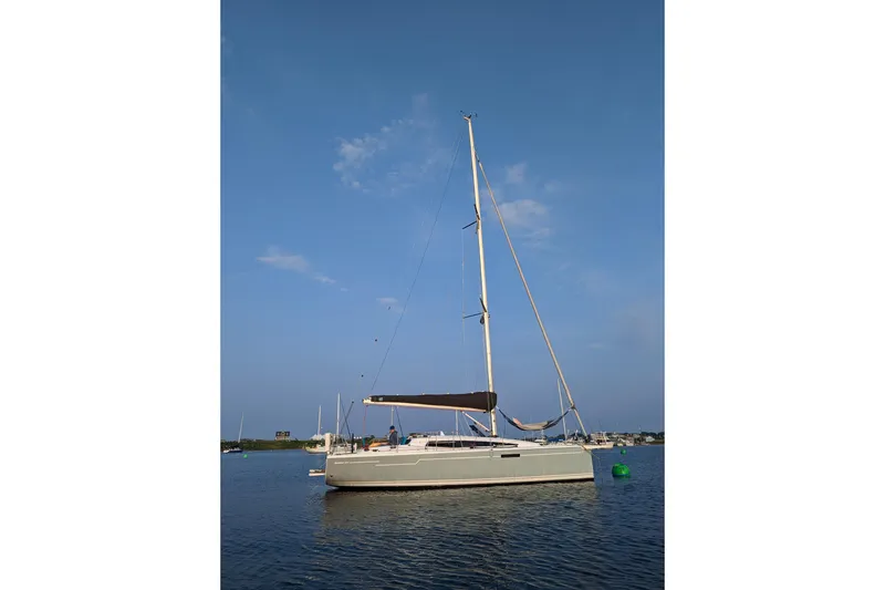Slide: The Image of 2019 Dehler 34c sailboat on calm sea under clear blue sky. - 8