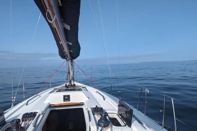 Slide: The Image of 2019 Dehler 34c sailboat named "Junkanoo" in Newport marina. - 9
