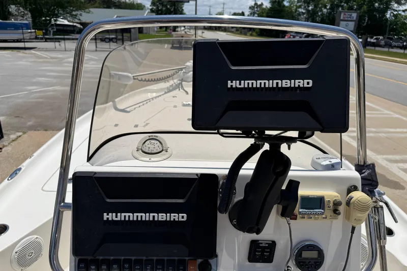 Slide: The Image of 2019 Key West 230 Bay Reef boat dashboard with Humminbird electronics and navigation equipment. - 10