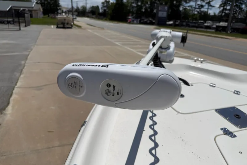 Slide: The Image of 2019 Key West 230 Bay Reef boat with Minn Kota trolling motor on deck. - 17