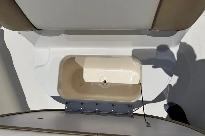 Slide: The Image of 2019 Key West 230 Bay Reef boat storage compartment, open and empty. - 20