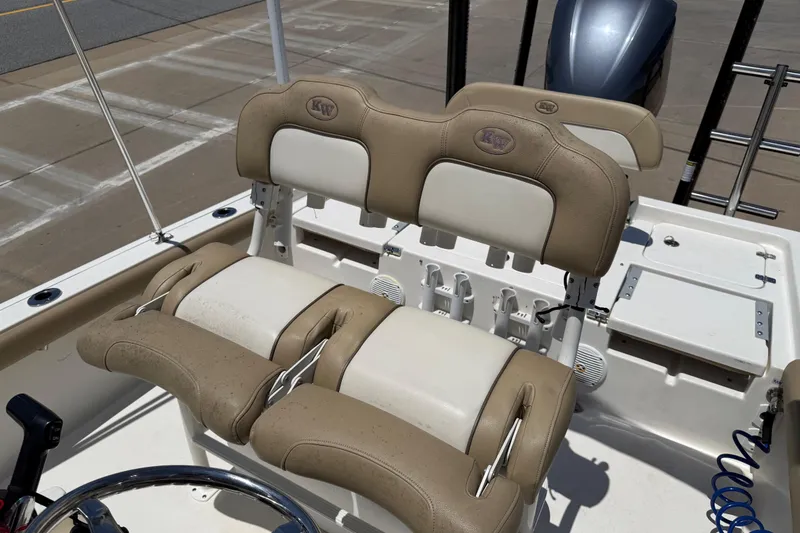 Slide: The Image of 2019 Key West 230 Bay Reef boat seats with beige and white upholstery. - 22