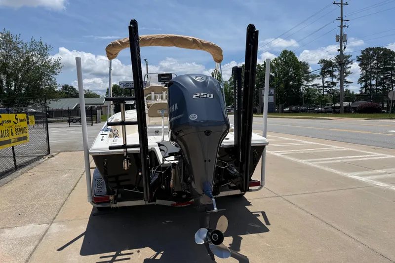 Slide: The Image of 2019 Key West 230 Bay Reef boat with Yamaha 250 engine, parked outdoors. - 5