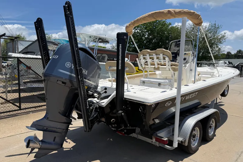 Slide: The Image of 2019 Key West 230 Bay Reef boat with Yamaha engine on trailer. - 7