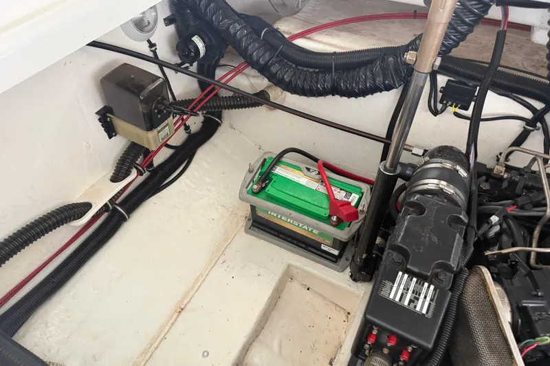 Slide: The Image of Engine compartment of a 1998 Formula 280 Sun Sport boat with battery and wiring. - 22