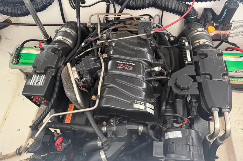 Slide: The Image of Engine of a 1998 Formula 280 Sun Sport boat, featuring Volvo Penta 7.4Gi components. - 23