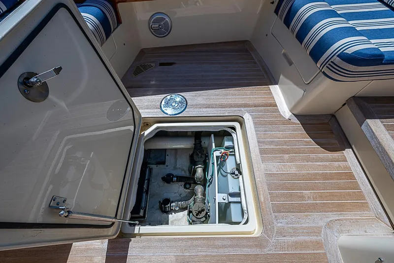 Slide: The Image of Open hatch on 2016 Hinckley Picnic Boat 37 MKIII, revealing engine compartment. - 23