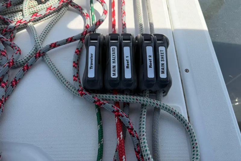 Slide: The Image of Sailing ropes and clutches on a 2007 Beneteau 343 yacht deck. - 14