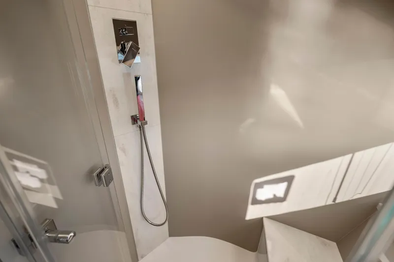 Slide: The Image of Modern shower area in 2023 Galeon 400 Fly yacht, featuring sleek fixtures and minimalist design. - 32