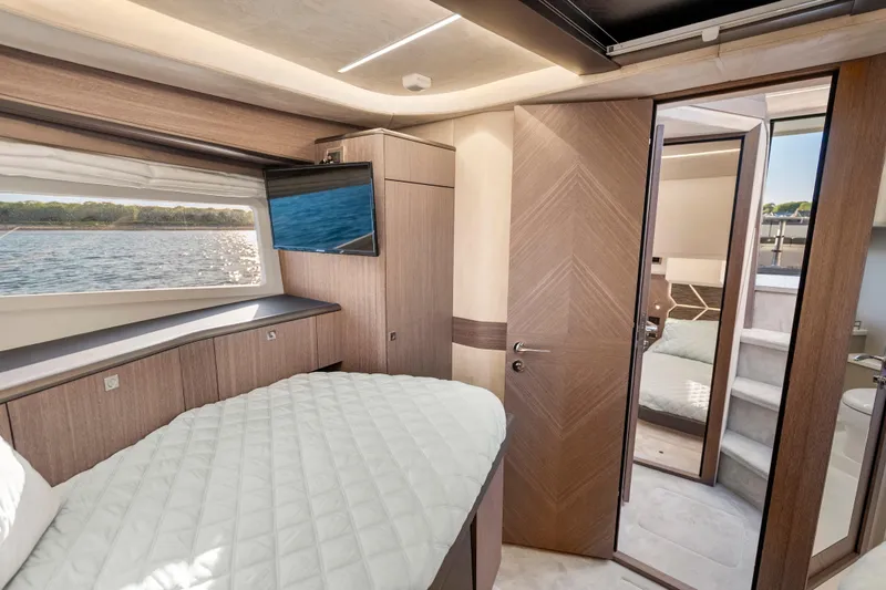 Slide: The Image of Luxurious interior of 2023 Galeon 400 Fly yacht with scenic water view. - 34