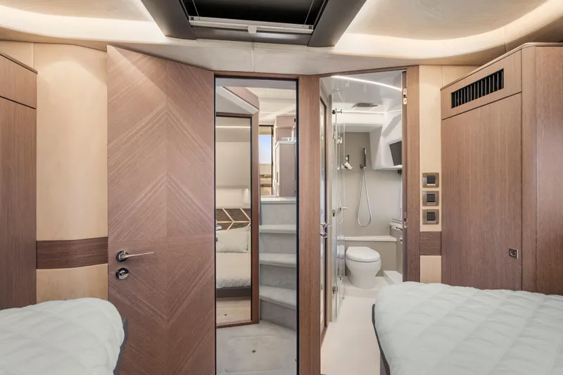 Slide: The Image of Luxurious interior of 2023 Galeon 400 Fly yacht featuring modern bathroom and cozy cabin. - 36