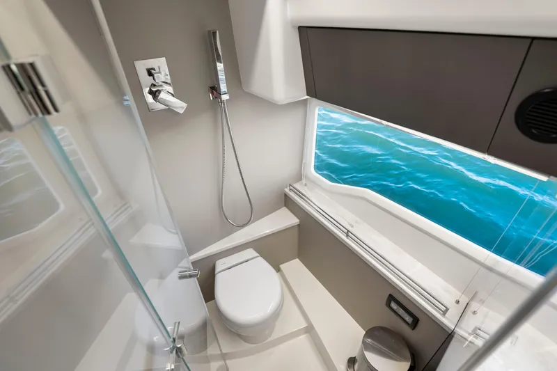 Slide: The Image of Luxurious bathroom on 2023 Galeon 400 Fly yacht with ocean view window. - 39