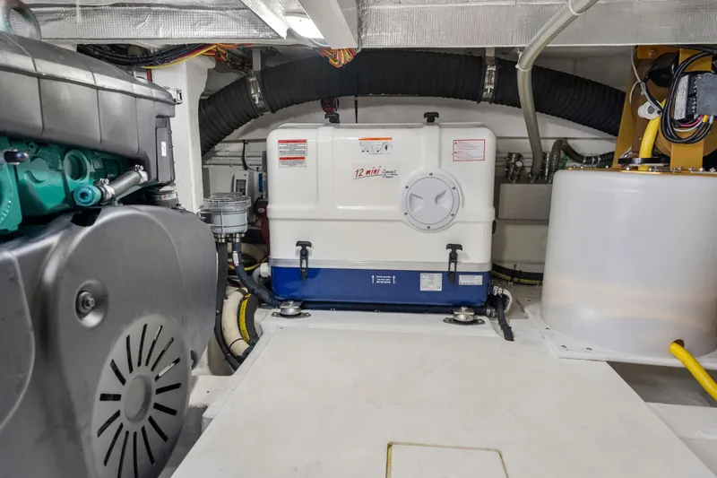 Slide: The Image of Engine room of 2023 Galeon 400 Fly yacht, featuring mechanical components and equipment. - 47