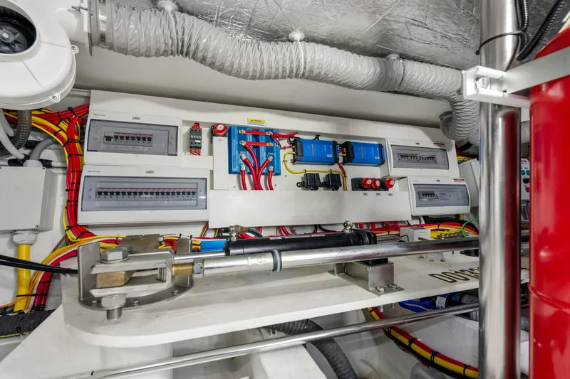 Slide: The Image of Electrical system of 2023 Galeon 400 Fly yacht, featuring control panels and wiring. - 49