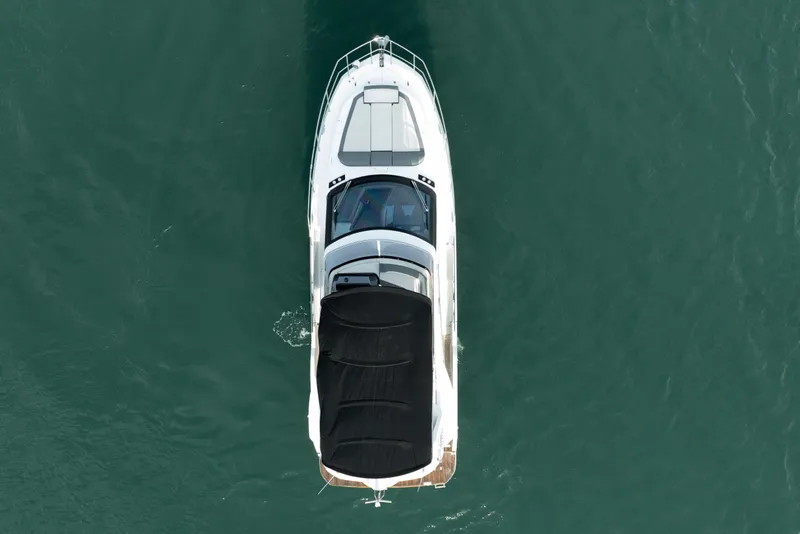 Slide: The Image of Aerial view of 2023 Galeon 400 Fly yacht cruising on open water. - 9
