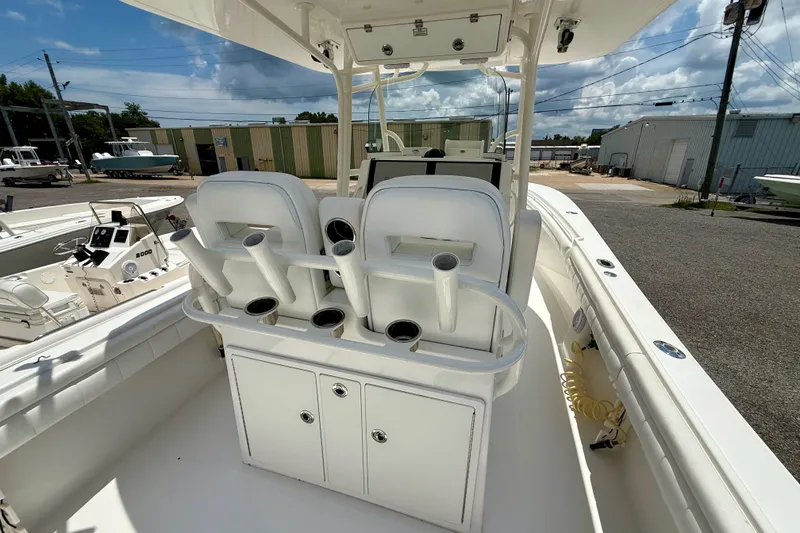 Slide: The Image of 2017 Regulator 28 boat interior with dual seats and rod holders. - 3