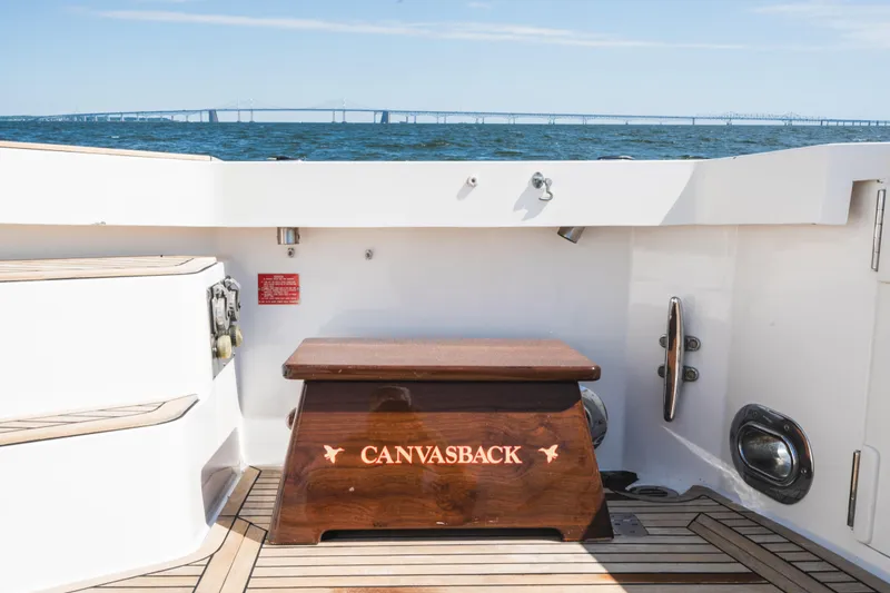 Slide: The Image of 1999 Grand Banks 49 Eastbay HX yacht deck with ocean and bridge view. - 12
