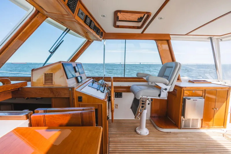 Slide: The Image of Interior helm of 1999 Grand Banks 49 Eastbay HX yacht with ocean view. - 33