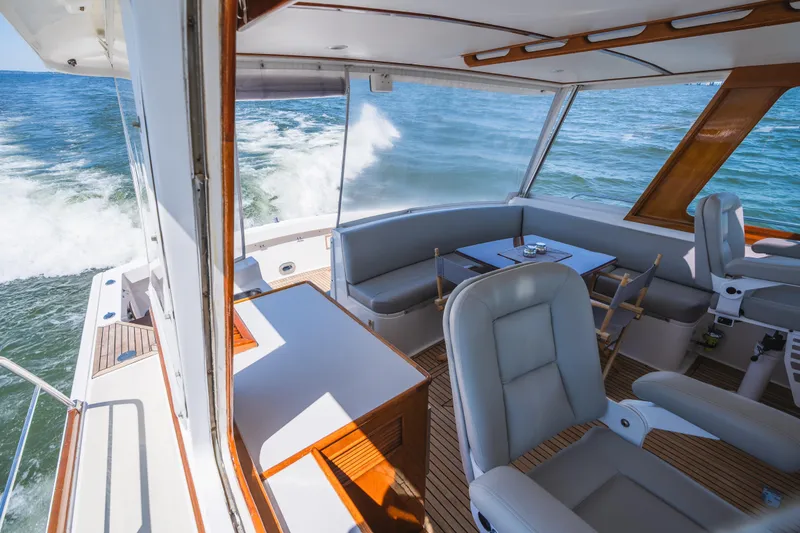 Slide: The Image of Luxurious 1999 Grand Banks 49 Eastbay HX yacht interior with ocean view. - 37