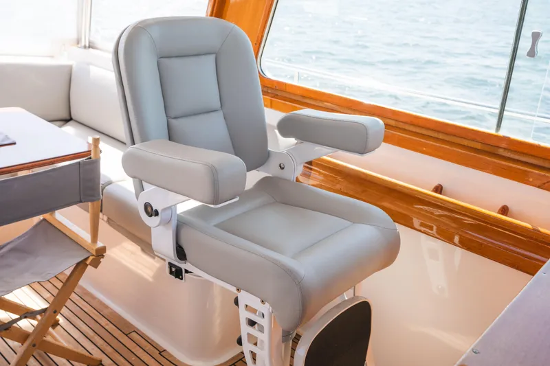 Slide: The Image of Luxurious helm seat on 1999 Grand Banks 49 Eastbay HX yacht interior. - 39
