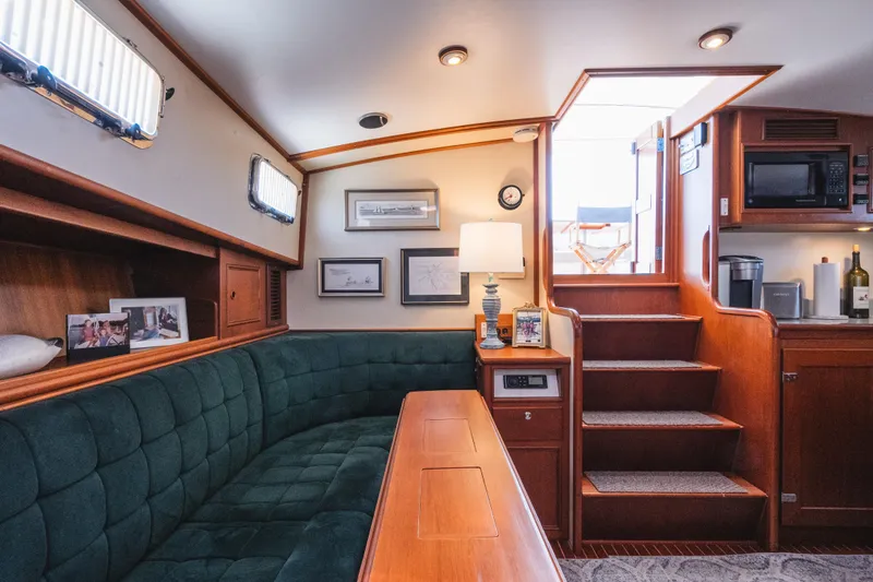 Slide: The Image of Luxurious interior of 1999 Grand Banks 49 Eastbay HX yacht with elegant wood finishes. - 43