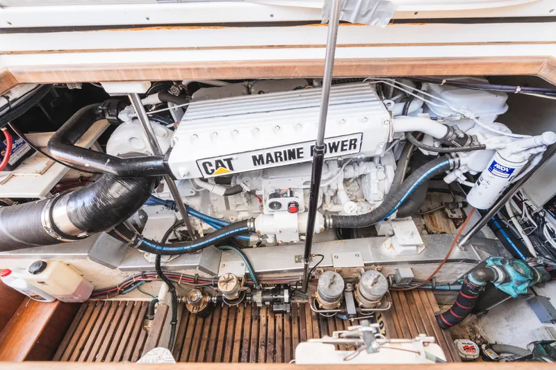 Slide: The Image of Engine compartment of 1999 Grand Banks 49 Eastbay HX with CAT Marine Power engine. - 59