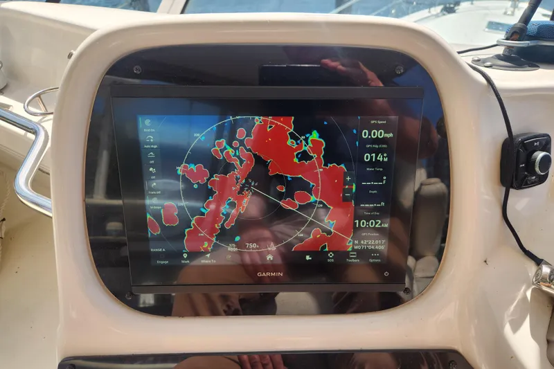 Slide: The Image of Garmin navigation display on 2001 Sea Ray 400 Sedan Bridge yacht dashboard. - 10