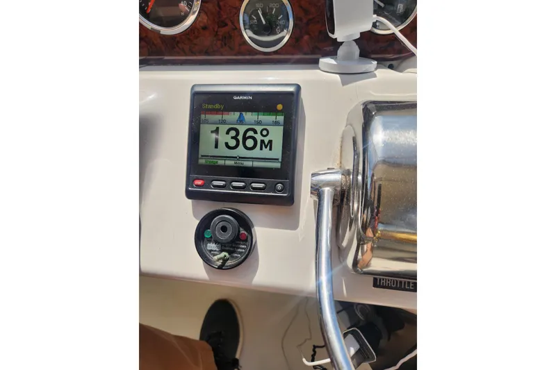 Slide: The Image of Garmin navigation display on 2001 Sea Ray 400 Sedan Bridge boat dashboard. - 31