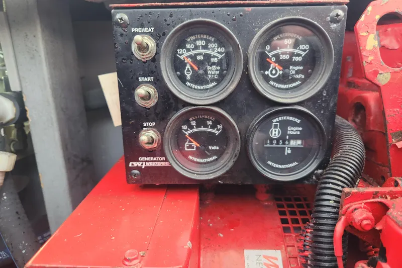 Slide: The Image of Control panel of Westerbeke generator on 2001 Sea Ray 400 Sedan Bridge yacht. - 34