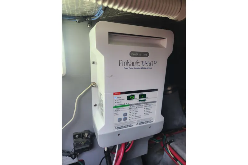 Slide: The Image of ProNautic 12-50P charger in 2001 Sea Ray 400 Sedan Bridge boat. - 37