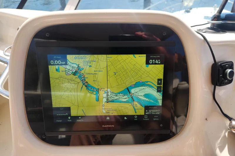 Slide: The Image of Garmin GPS display on 2001 Sea Ray 400 Sedan Bridge, showing nautical map. - 9