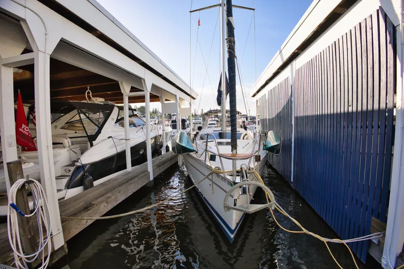 Slide: The Image of 1994 Hunter Passage sailboat docked in marina. - 20