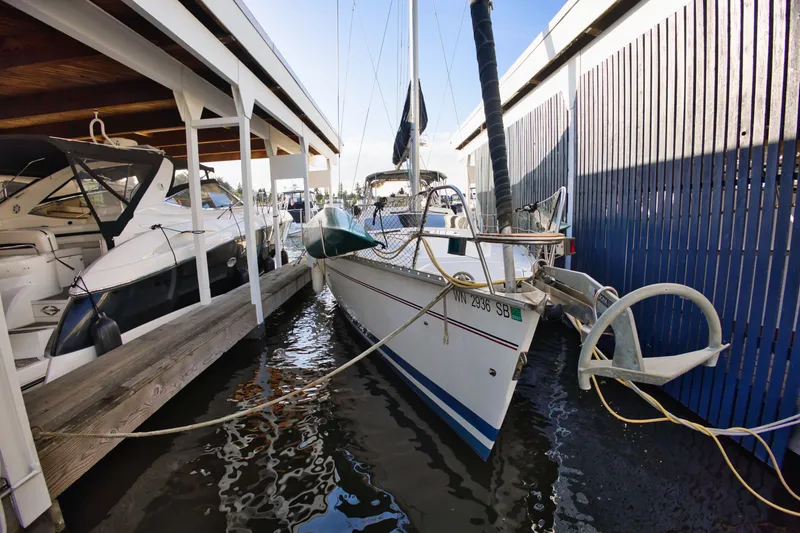 Slide: The Image of 1994 Hunter Passage sailboat docked in marina. - 21